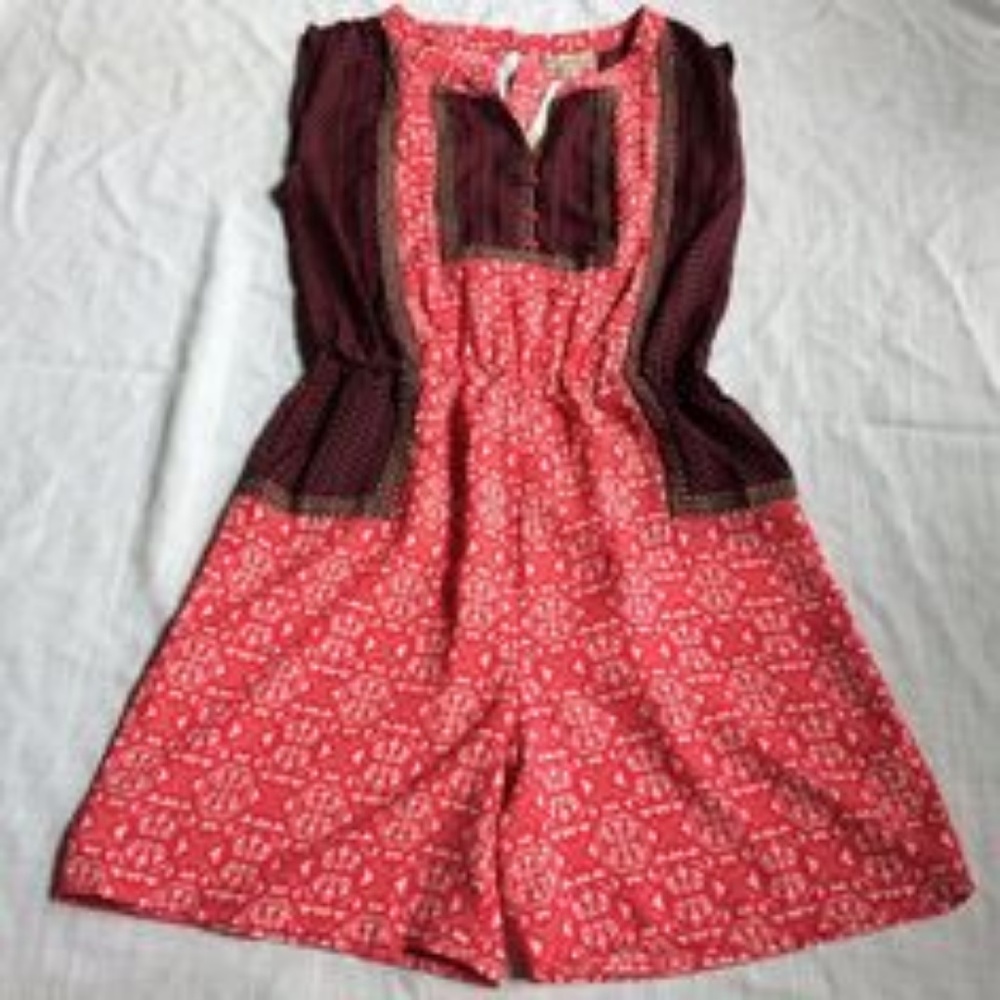NWT Sleeveless romper size Large